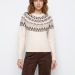 Camisola de cor bege
